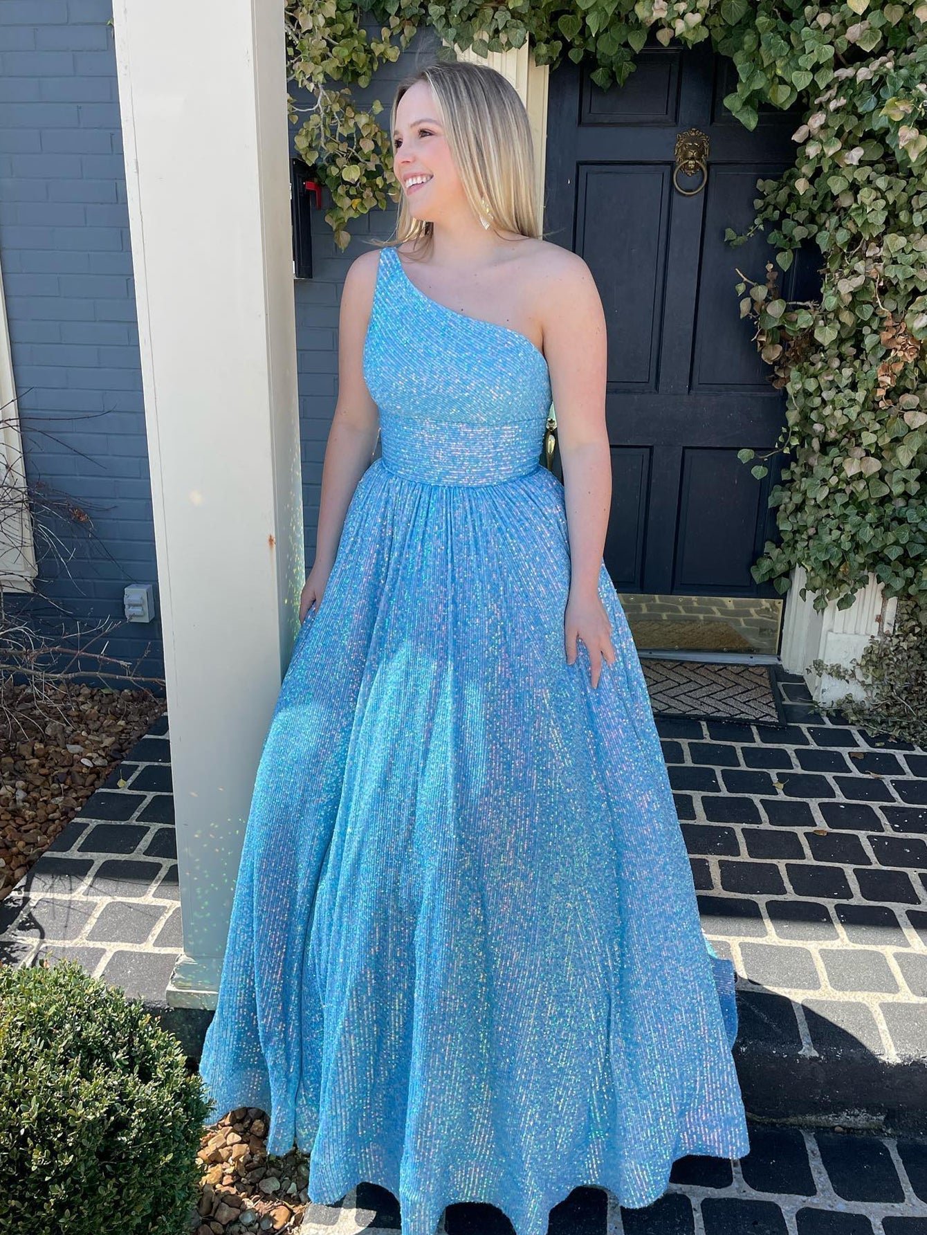 Vestido de fiesta de lentejuelas con un solo hombro y bolsillos en corte A