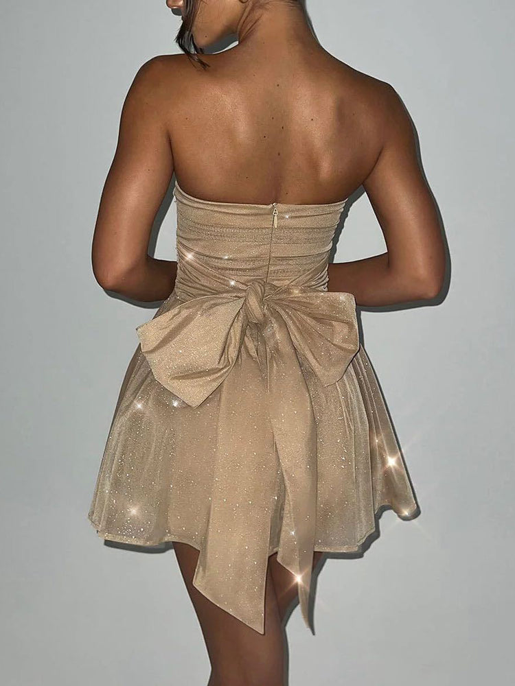 TARUXY Vestido de noche con lentejuelas brillantes para mujer, minivestido ajustado con volantes y hombros descubiertos, vestido de fiesta con lazo y espalda descubierta sexy para mujer