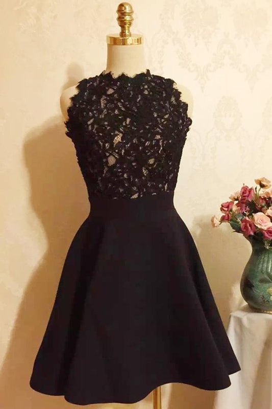 Vestido de fiesta negro sin tirantes, estilo halter, con apliques y corte corto.