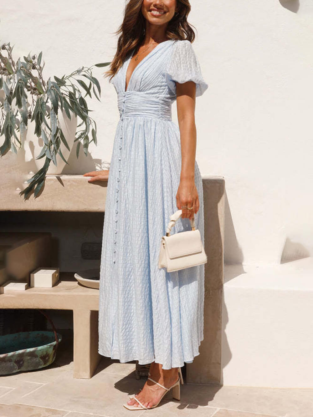 Kleid mit Puffärmeln, V-Ausschnitt und langem Oversize-Saum