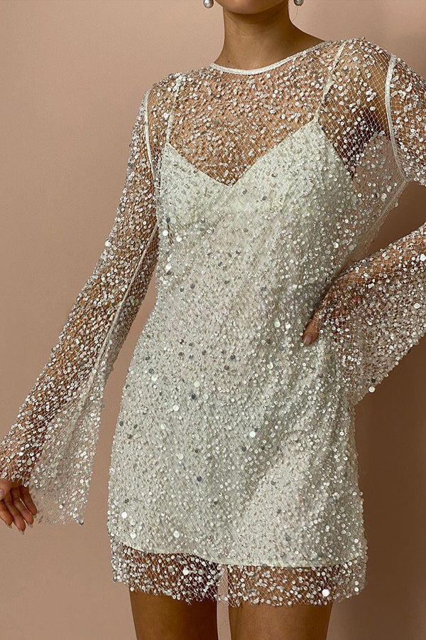 Minikleid aus glitzerndem und glänzendem Pailletten- und Perlenstoff mit separatem Unterkleid