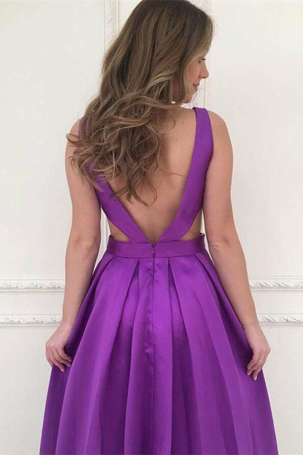 Vestido de fiesta sin mangas, con escote en V y espalda descubierta, corte A y bolsillos prácticos