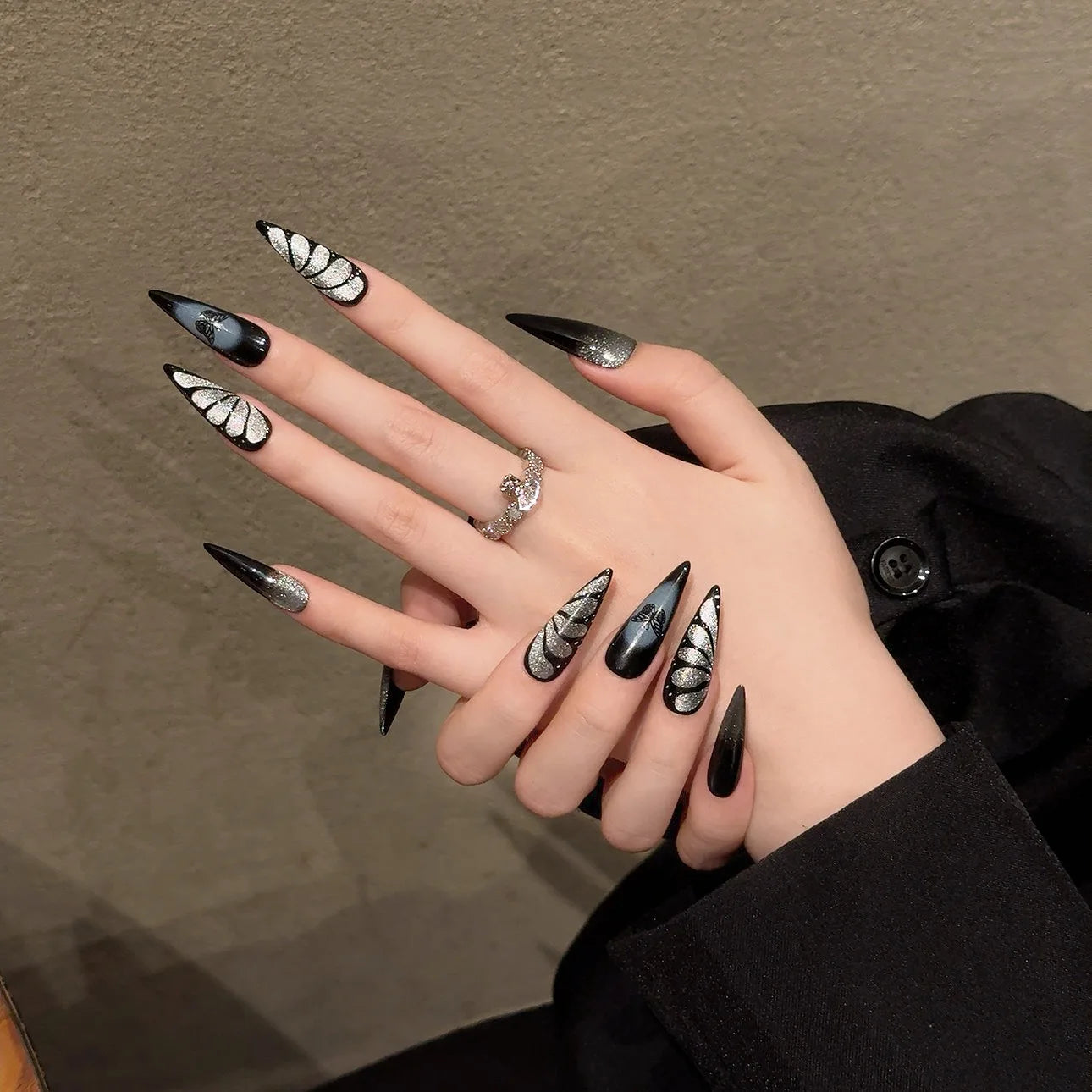 Uñas postizas de mariposa negra ABS con diseño de ojos de gato, dulces, geniales y sexys.