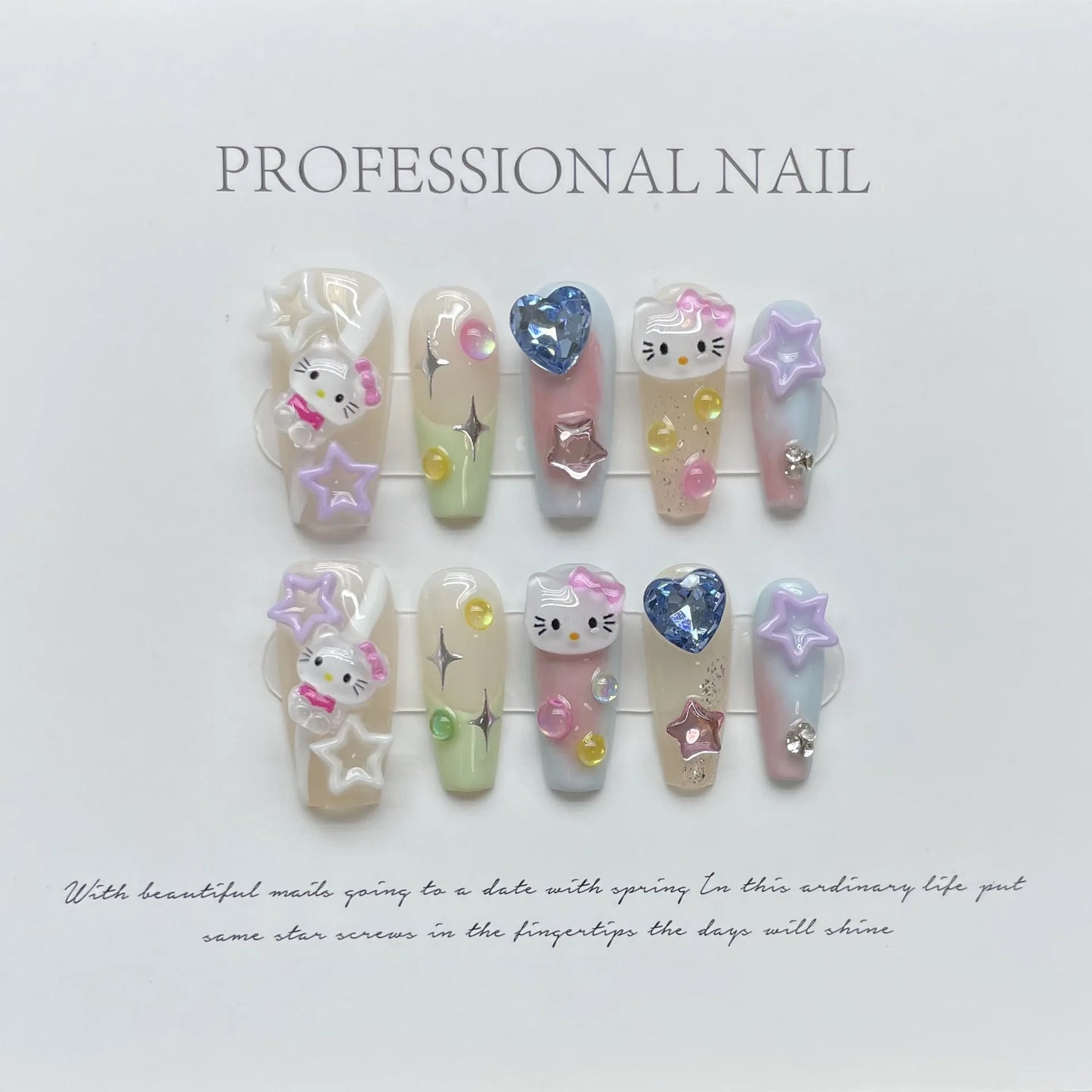 Uñas postizas de gel de longitud media con diseño de Hello Kitty, muy de moda.
