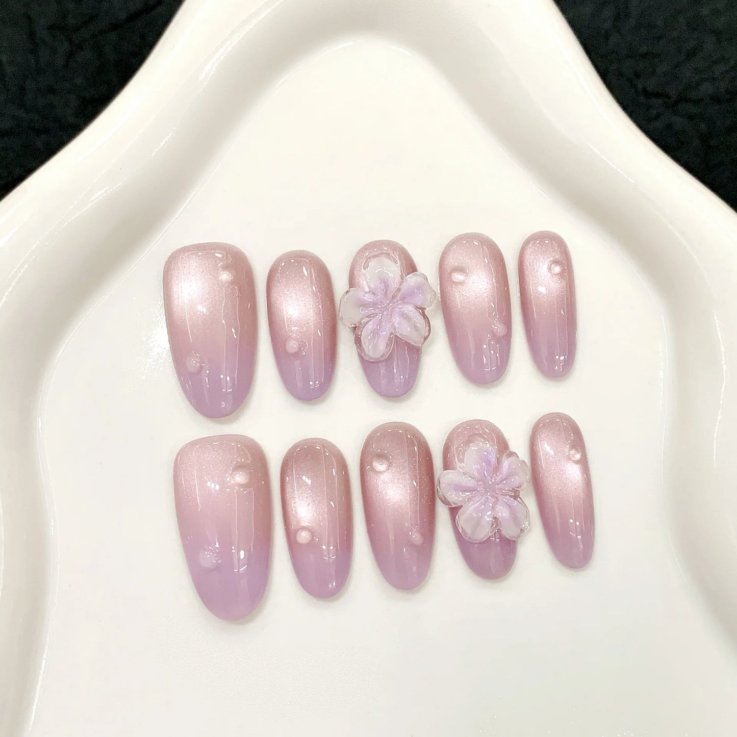Uñas postizas desmontables de primavera y verano con efecto degradado tallado tridimensional en forma de ojo de gato y gota de rocío.