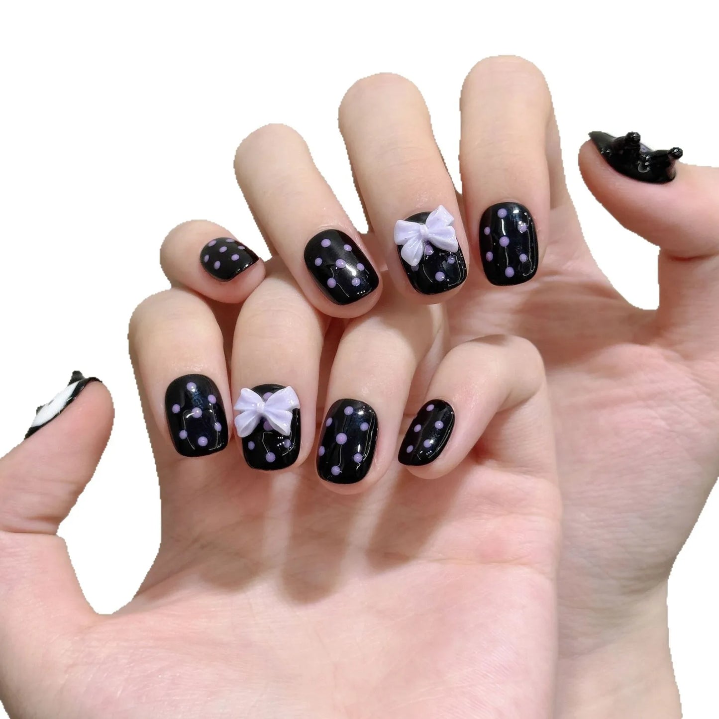 Nuevo estilo de uñas cortas con lazo de lunares moldeadas a mano en 3D