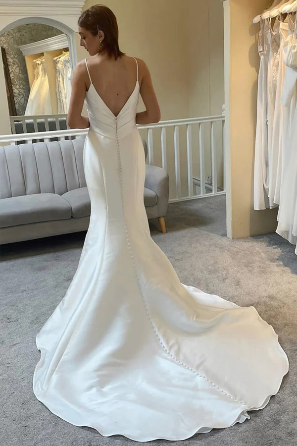 Elfenbeinfarbenes rückenfreies Trompeten-Brautkleid mit Spaghettiträgern