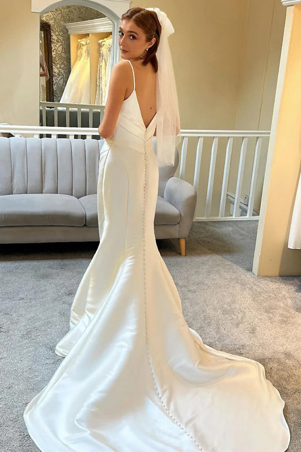 Elfenbeinfarbenes rückenfreies Trompeten-Brautkleid mit Spaghettiträgern