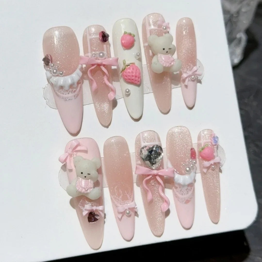 10 uñas postizas de ojo de gato doradas brillantes, con dobladillo de perla francesa, color rosa melocotón, hechas a mano, con lazo y almendra larga.