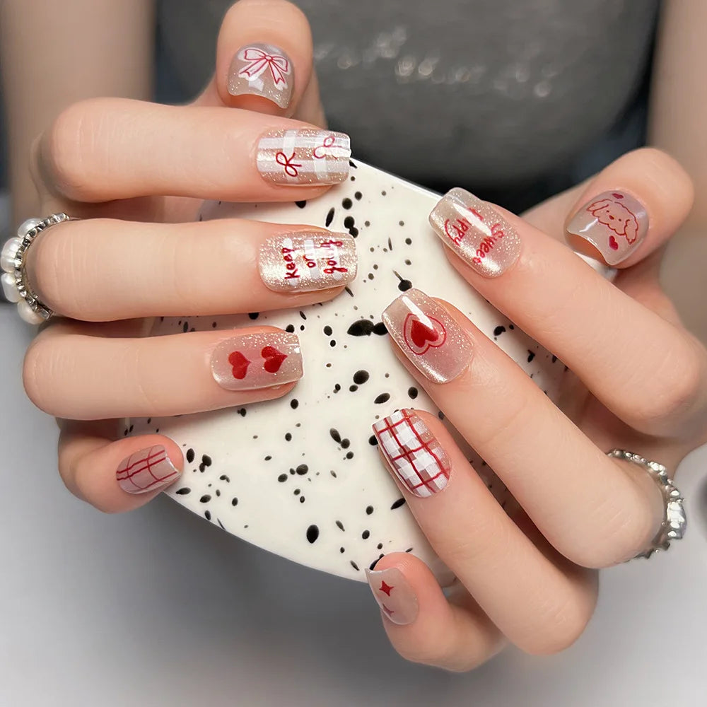 10 uñas postizas hechas a mano con diseño de perro kawaii, diseño de ojo de gato, lazos rojos, diseño de corazón, uñas postizas encantadoras.