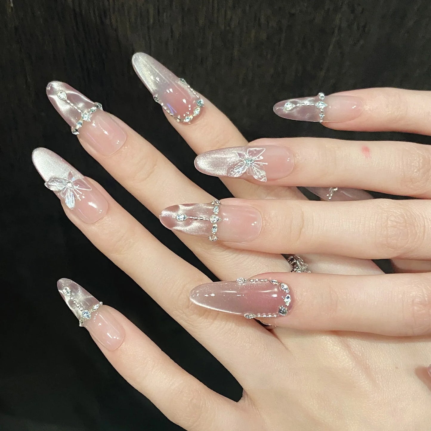 10 uñas postizas hechas a mano con diseño de mariposa de cristal, brillantes y decorativas, estilo francés, con diseño de ojo de gato rosa dulce.