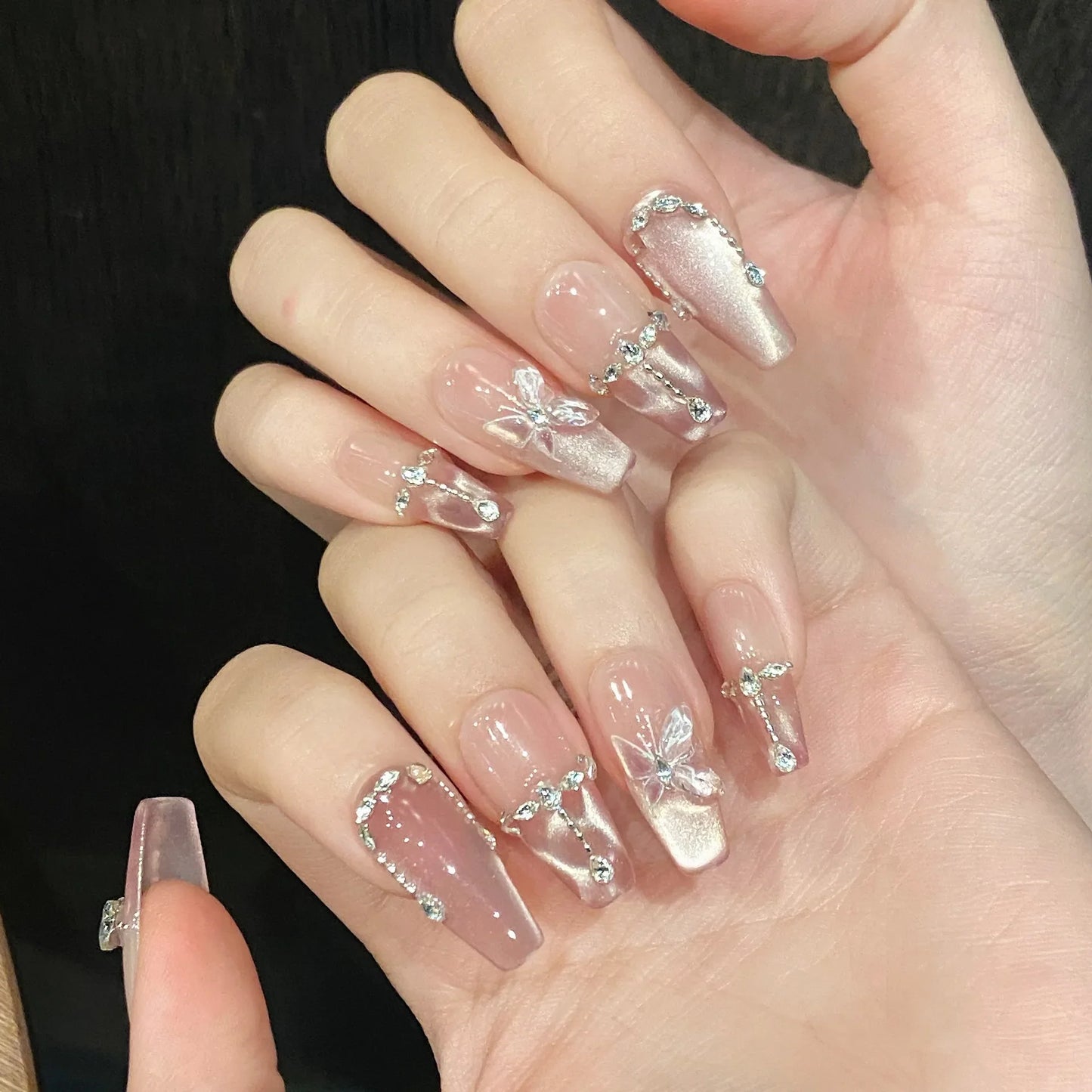 10 uñas postizas hechas a mano con diseño de mariposa de cristal, brillantes y decorativas, estilo francés, con diseño de ojo de gato rosa dulce.