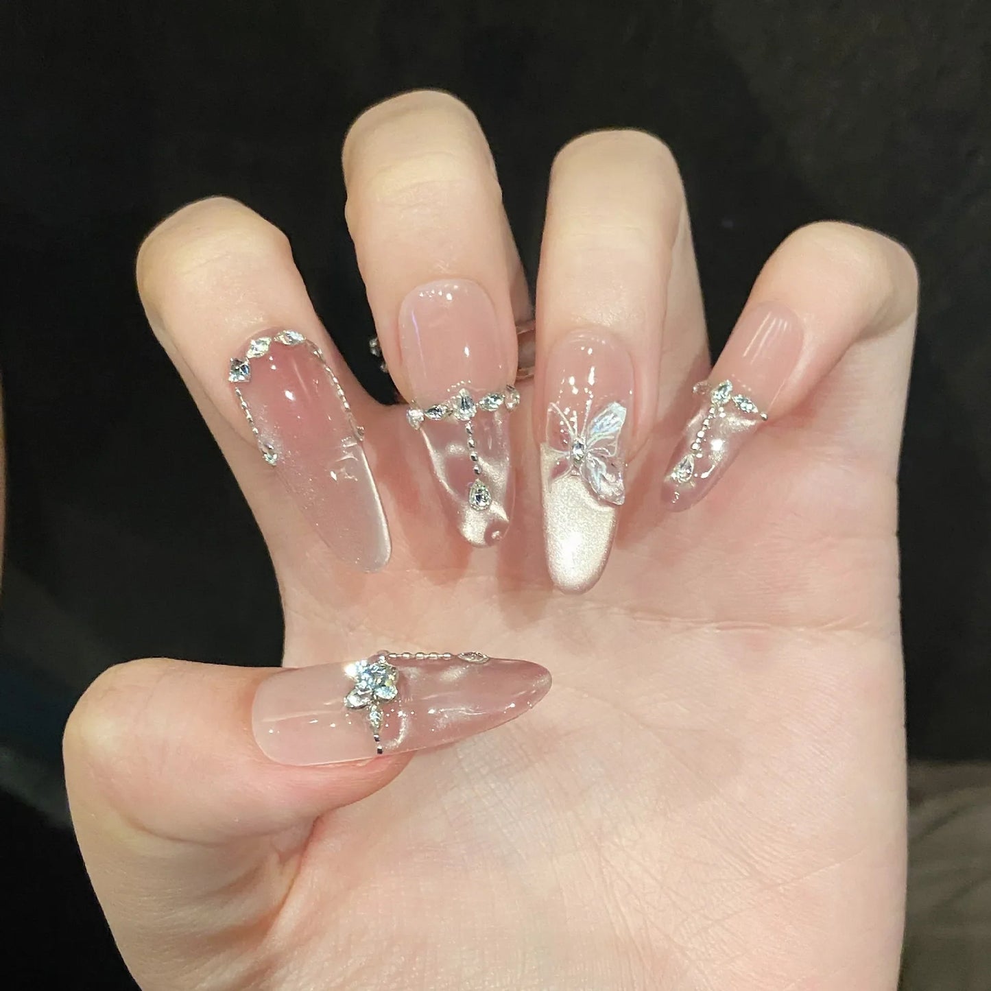 10 uñas postizas hechas a mano con diseño de mariposa de cristal, brillantes y decorativas, estilo francés, con diseño de ojo de gato rosa dulce.