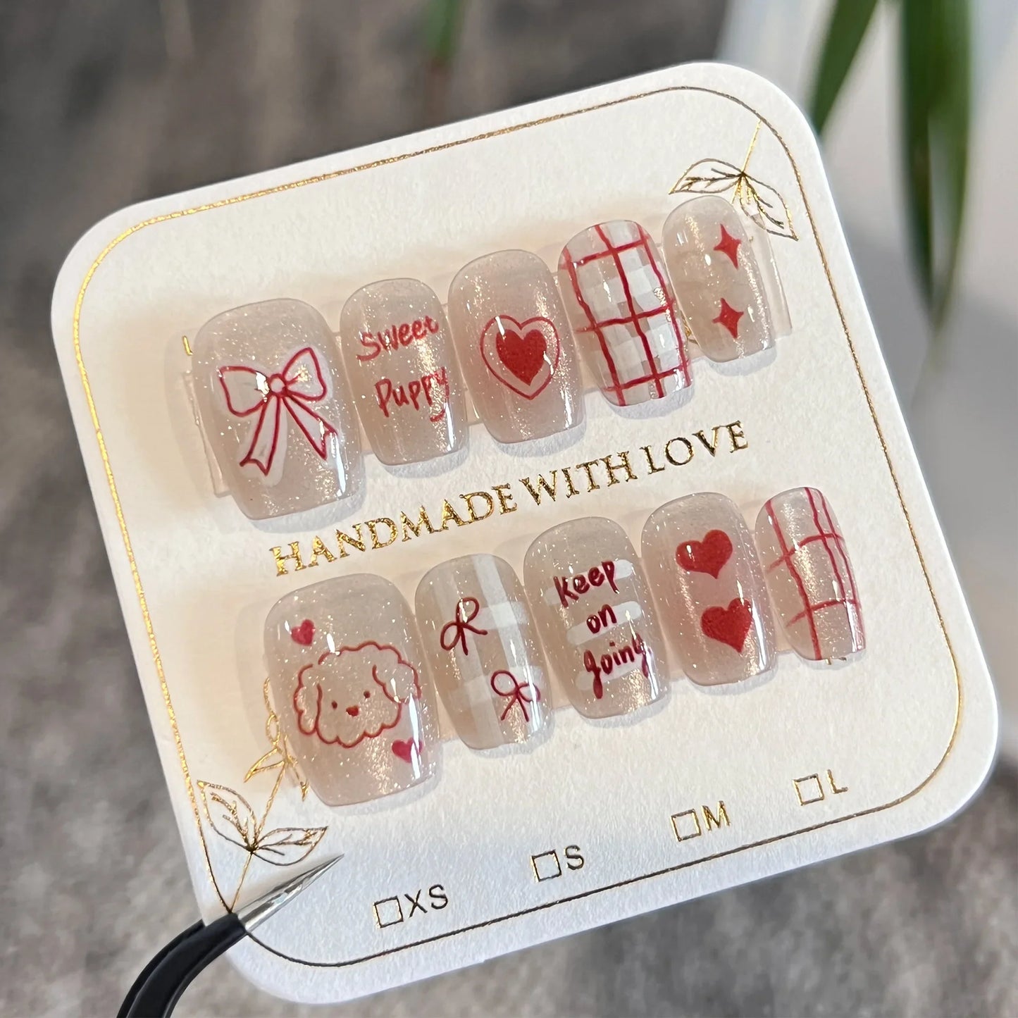 10 uñas postizas hechas a mano con diseño de perro kawaii, diseño de ojo de gato, lazos rojos, diseño de corazón, uñas postizas encantadoras.