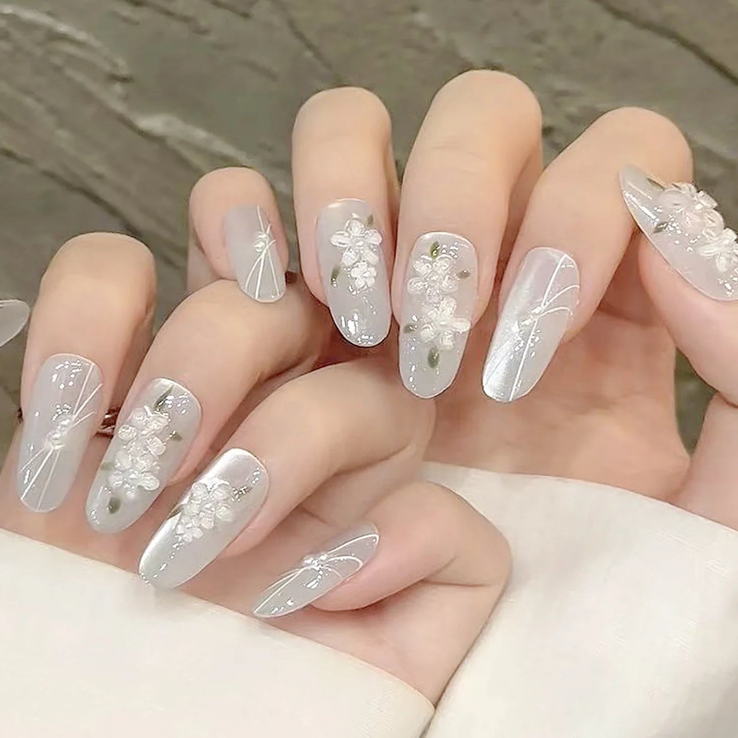 10 uñas postizas brillantes de ojo de gato, hechas a mano, con diseño de almendra blanca y hojas de flores 3D, parches para uñas postizas para mujer.