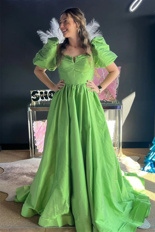 Vestido de fiesta largo de satén con mangas abullonadas y volantes