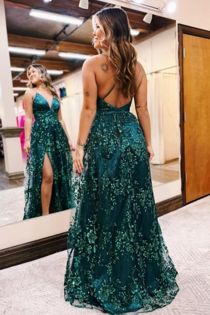 Hermoso vestido de fiesta de encaje con escote en V, sin mangas y apliques abiertos