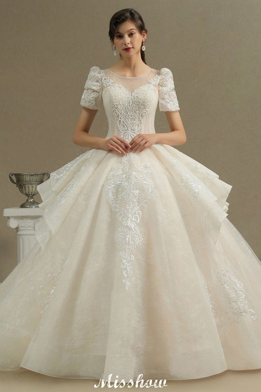 Vestido de novia elegante de manga corta con apliques de encaje de tul para primavera y jardín.