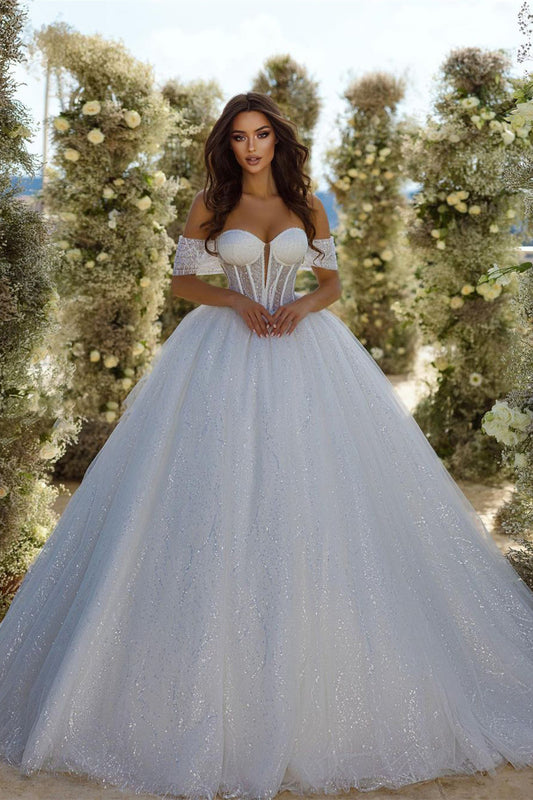 Vestido de novia elegante de tul brillante con escote en A, sin mangas y cola