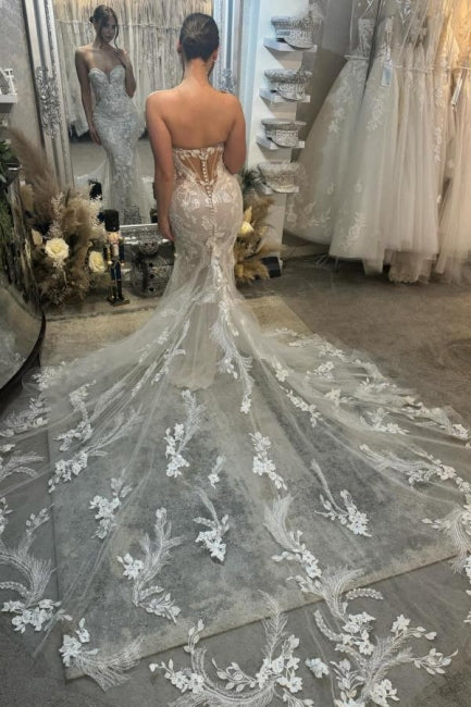 Designer-Säulen-Tüllspitze-Schatz-Ärmelloses Elfenbein-Brautkleid mit Applikationen und Schleppe