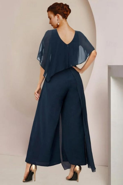 Traje de diseñador de dos piezas para madre de la novia, de gasa, con mangas cortas y volantes.