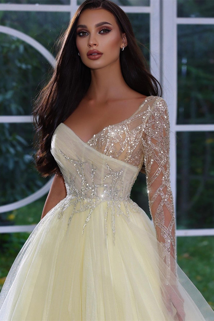 Elegante vestido de fiesta de manga larga con lentejuelas y cuentas en forma de A