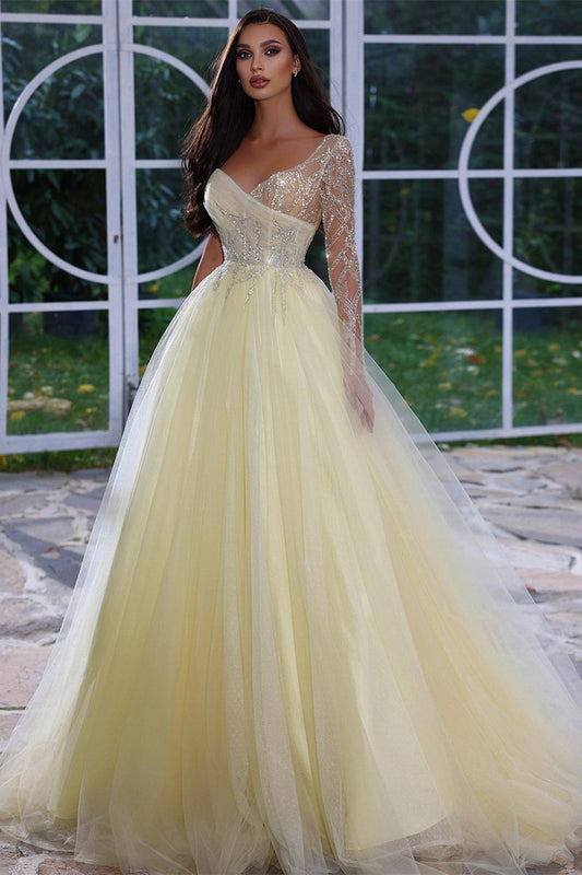 Elegante vestido de fiesta de manga larga con lentejuelas y cuentas en forma de A
