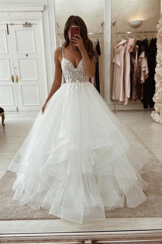 Elegante vestido de novia blanco de tul con escote en V, sin mangas y corte en A con encaje