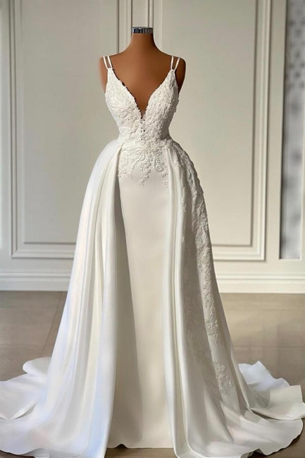 Glamuroso vestido de novia largo color marfil con escote en V, sin mangas y encaje