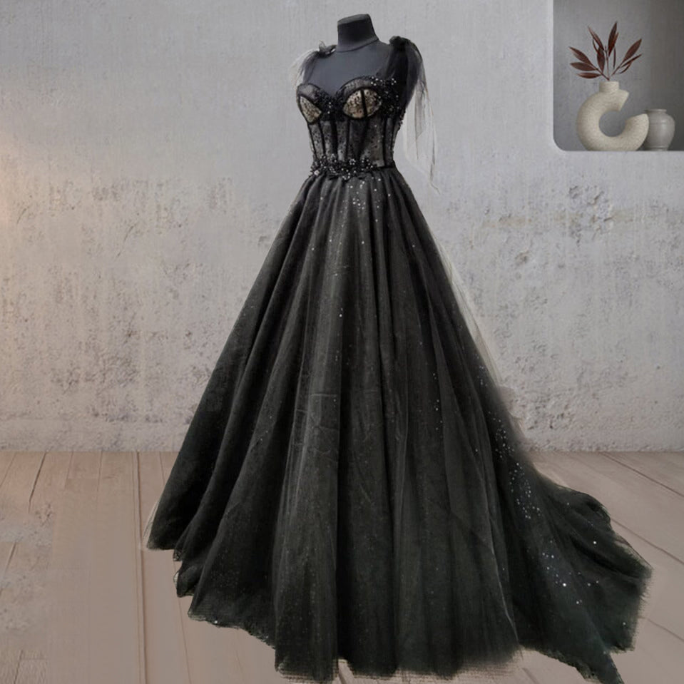 Vestido de novia negro con corte de corsé y tul con encaje brillante