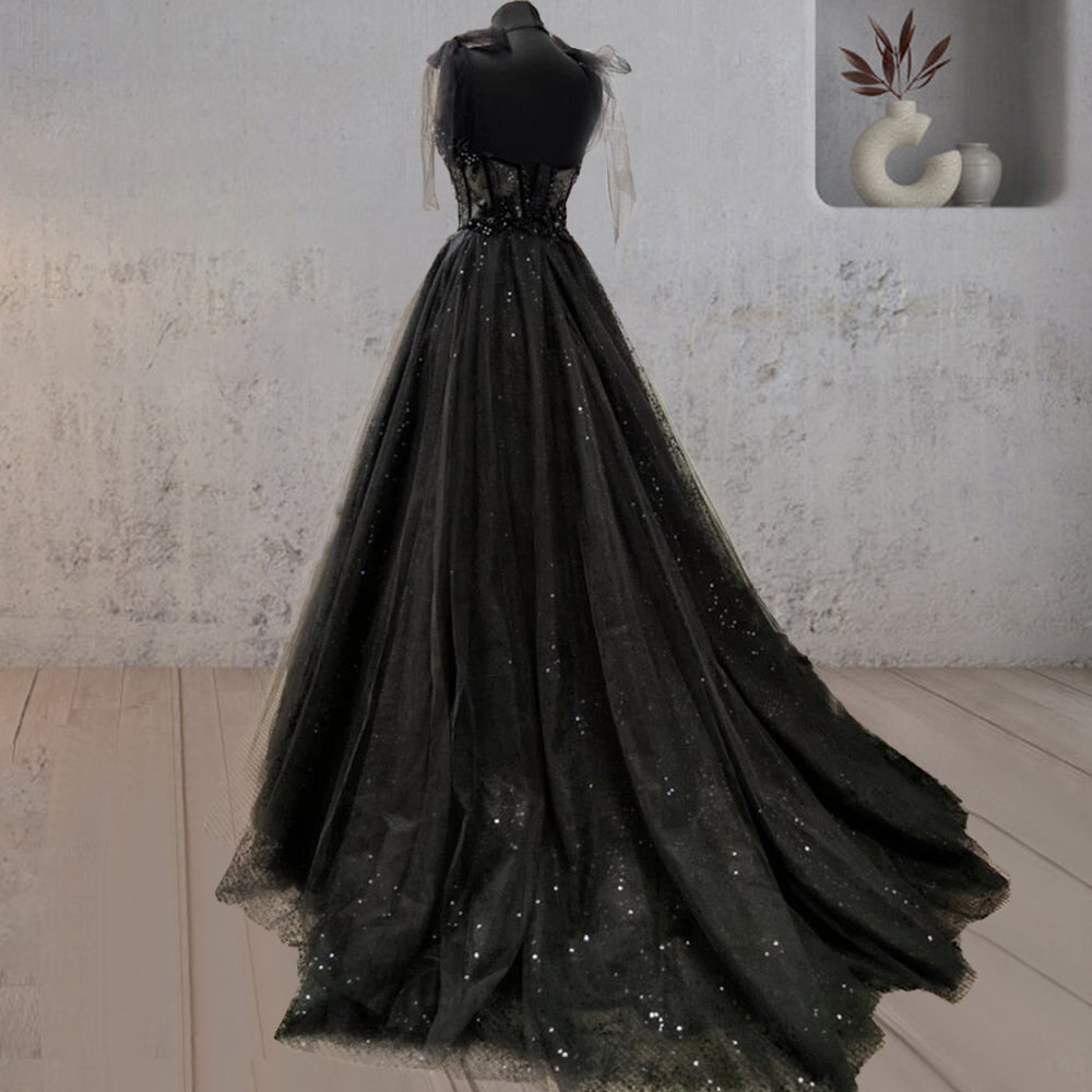 Vestido de novia negro con corte de corsé y tul con encaje brillante