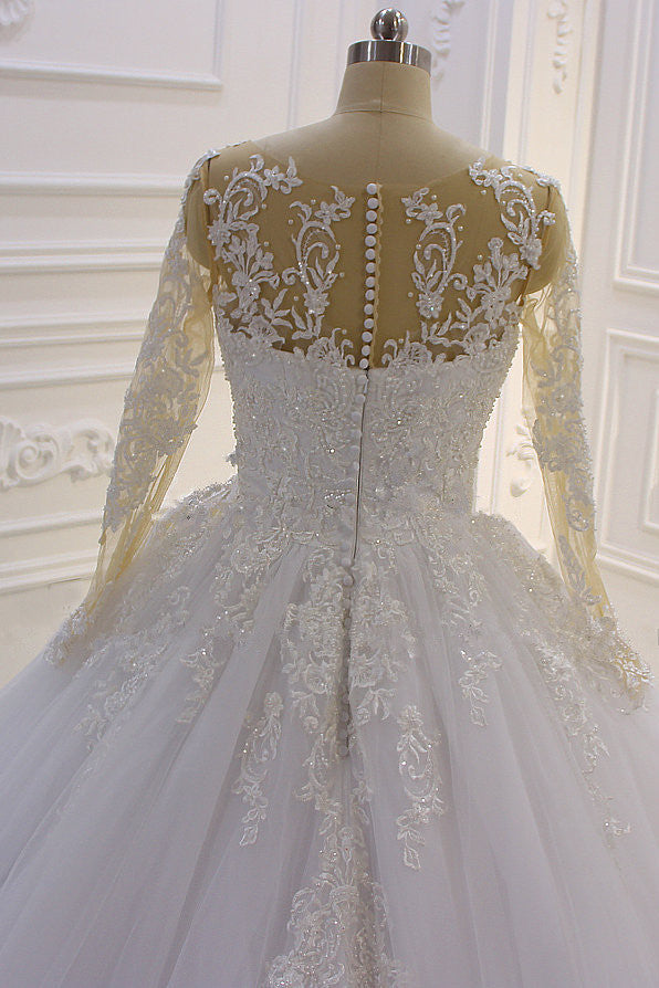 Wunderschönes langes A-Linien-Brautkleid in Bateau-Form mit Perlen, Tüllapplikationen und Spitze und Ärmeln