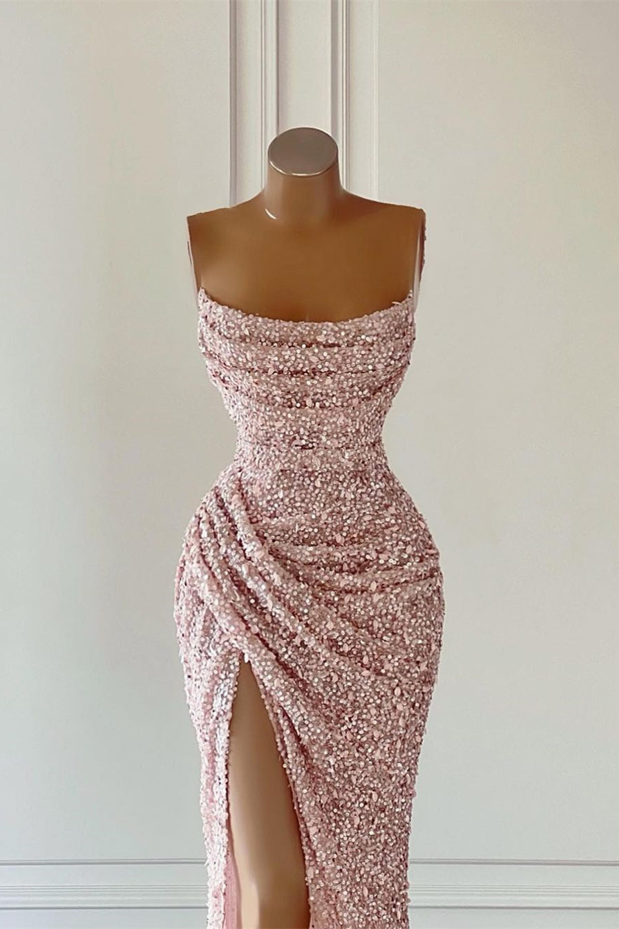 Hermoso vestido de fiesta sin mangas con lentejuelas rosas y abertura