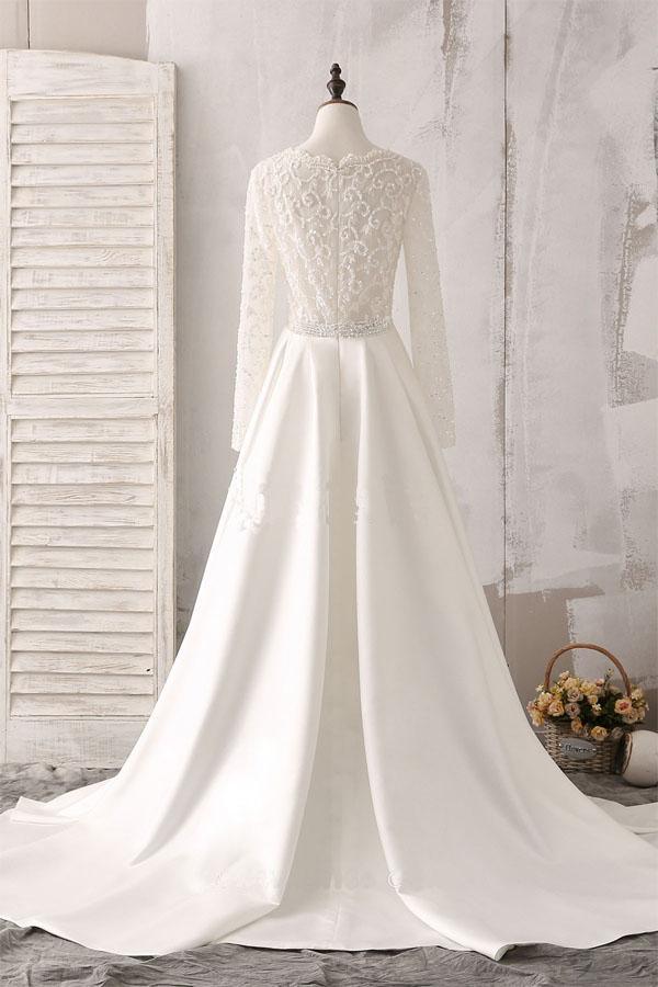 Elfenbeinfarbenes Brautkleid aus Spitze und Satin mit V-Ausschnitt und langen Ärmeln sowie Perlen