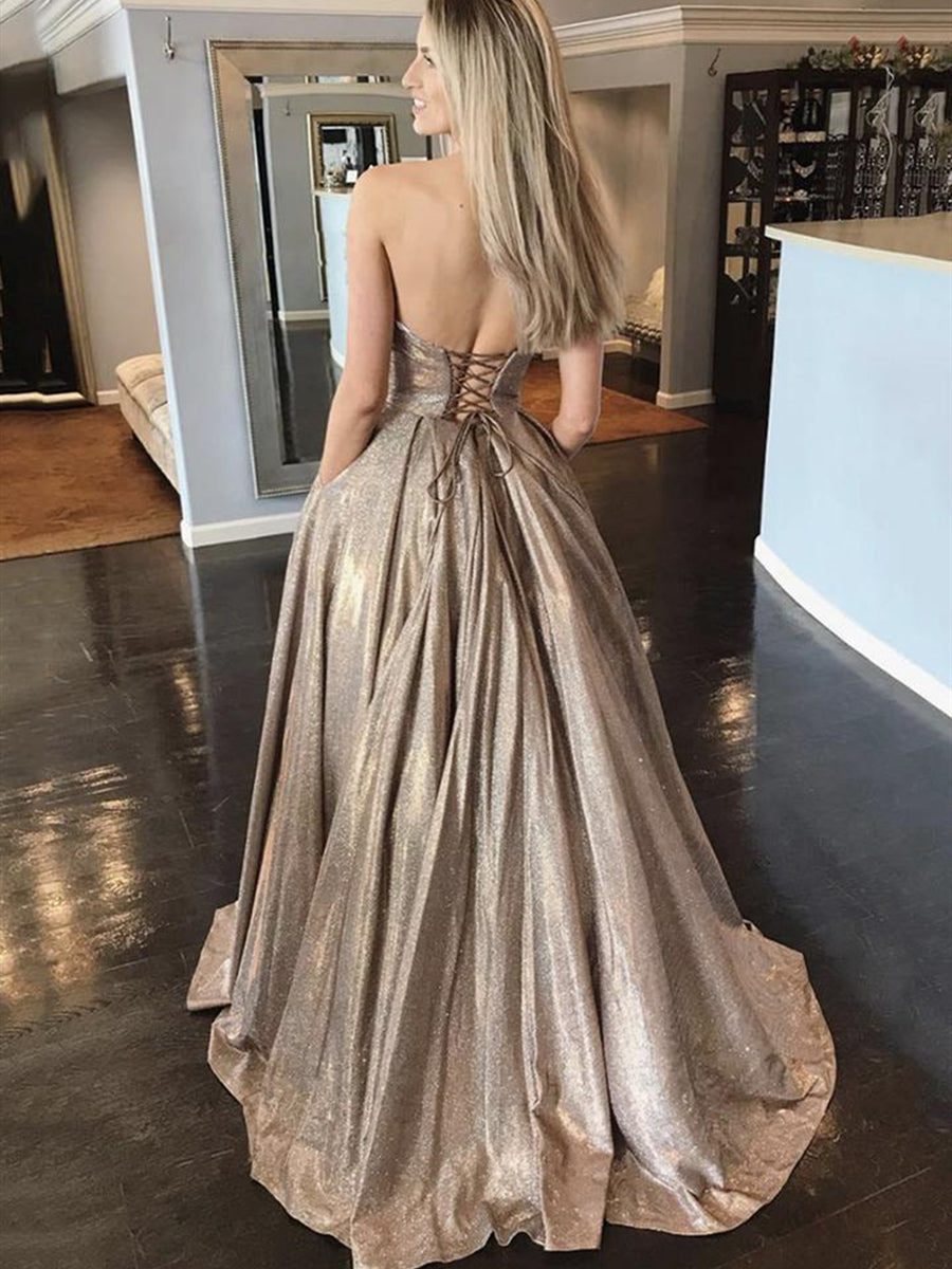 Langes, rückenfreies, funkelndes A-Linien-Ballkleid mit Herzausschnitt und Taschen