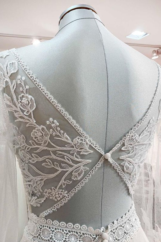Langes A-Linien-Brautkleid mit Herzausschnitt, Tüll, Perlen und Spitzenapplikationen und Ärmeln