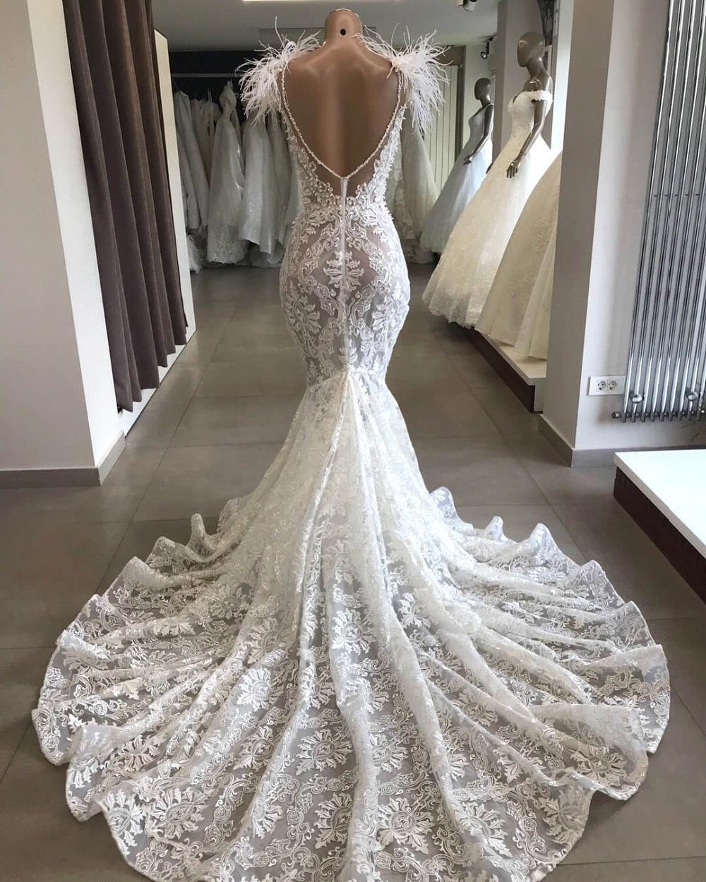 Langes Meerjungfrau-Brautkleid mit Herzausschnitt und Perlenapplikationen