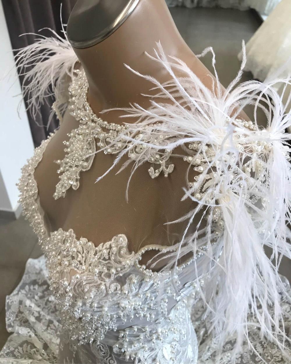 Langes Meerjungfrau-Brautkleid mit Herzausschnitt und Perlenapplikationen