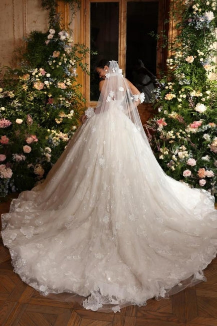 Luxuriöses langes elfenbeinfarbenes ärmelloses A-Linien-Prinzessin-Brautkleid mit Glitzer und Spitze