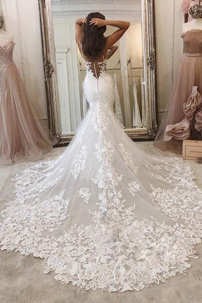 Vestido de novia de sirena con escote en V profundo y tirantes finos y cola larga