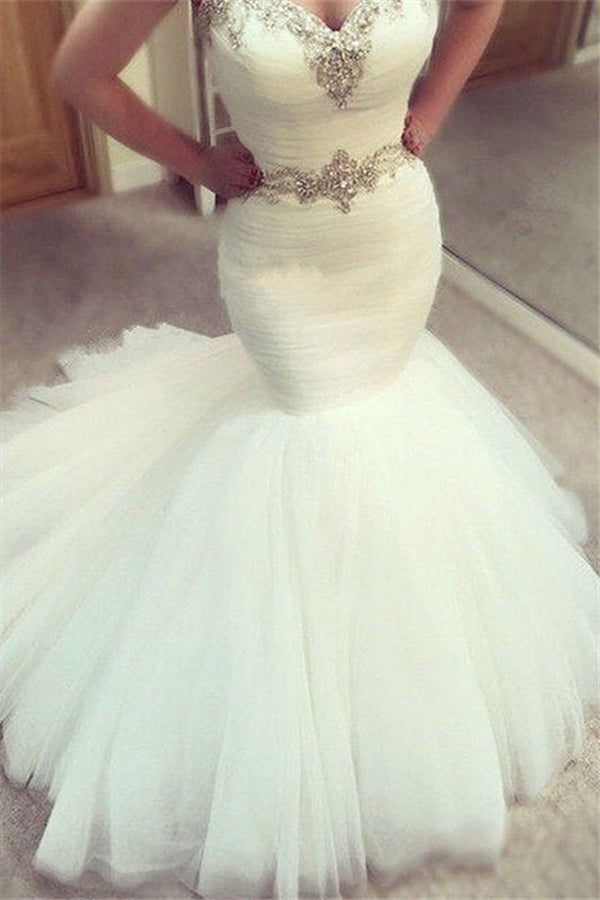Vestido de novia de sirena con volantes y escote corazón