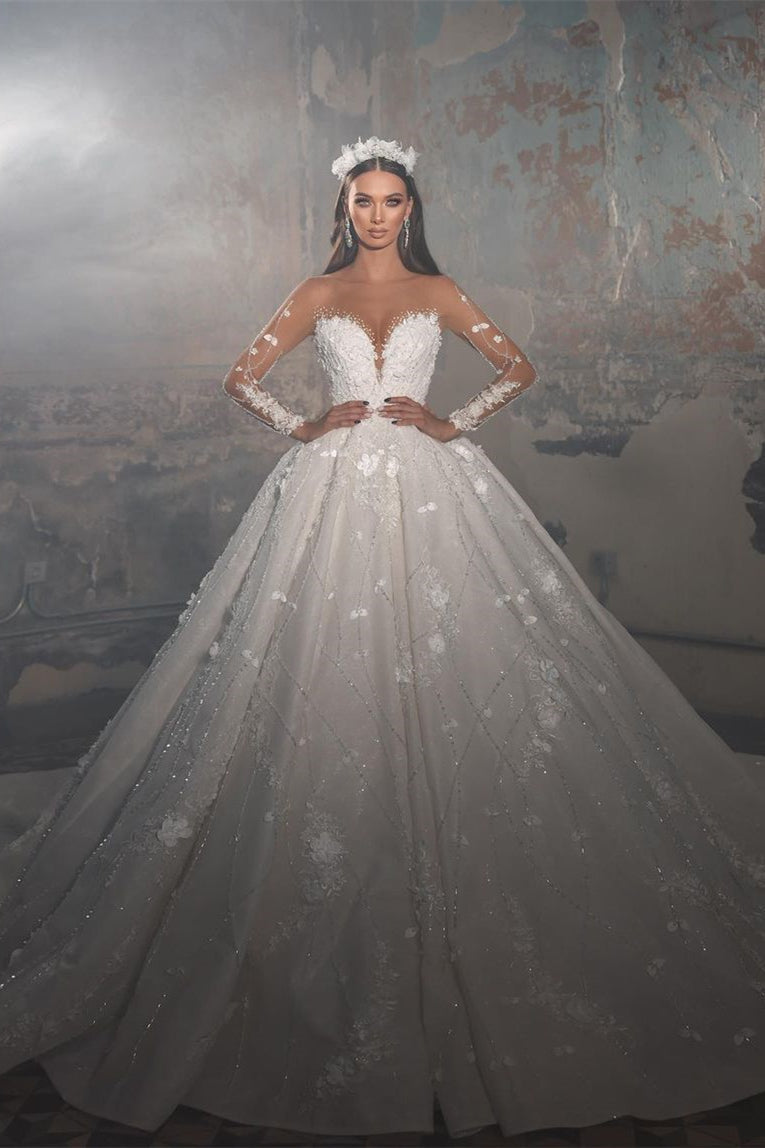 Trendiges bodenlanges A-Linien-Brautkleid aus Spitze mit V-Ausschnitt und langen Ärmeln und Applikationen