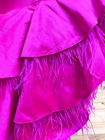 Vestido de fiesta largo irregular con escote en V y corte A en color fucsia