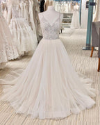 Modern Pearl Long A-Line Backless Wedding Dress With V-Neck
