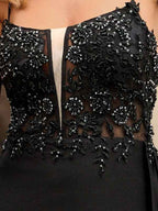 Black Appliqued Spaghetti Strap Prom Dress With Slit And Beaded Bodice
