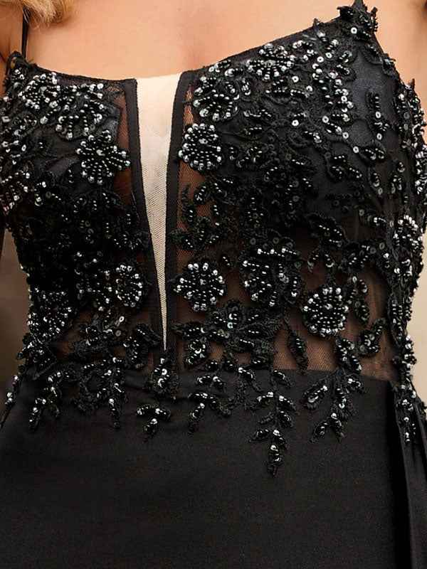 Black Appliqued Spaghetti Strap Prom Dress With Slit And Beaded Bodice