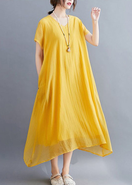 Abito lungo estivo giallo casual in cotone con scollo a V e design asimmetrico