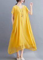 Abito lungo estivo giallo casual in cotone con scollo a V e design asimmetrico
