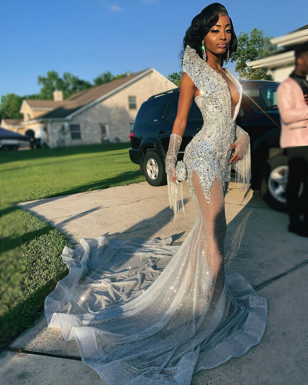 Silver Ice Crystal Beaded Mermaid Gown With Deep V Neck And Cascading Fringe