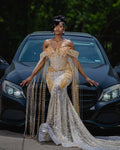 Champagne Gold Beaded Mermaid Gown Off Shoulder Dramatic Fringe Cape Mesh Panels